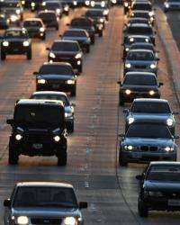 People drive on highway 134 at the end of the evening rush hour in Glendale, California