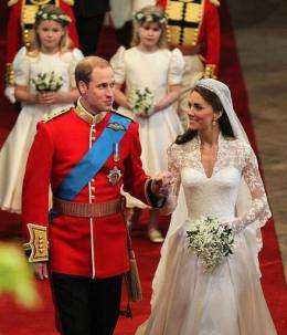 Prince William (L) and his new wife Kate, The Duchess of Cambridge