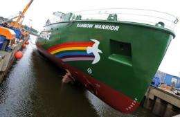 The new "Rainbow Warrior III" sailing ship is lowered into the water at the Fassmer shipyard in Berne-Motzen in July