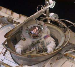 This NASA image shows astronaut Drew Feustel as reentering the space station after completing an 8-hour, 7-min spacewalk