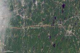 Landsat satellite images compare before and after Massachusetts tornado