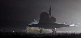 2nd last space shuttle lands; final on launch pad (AP)