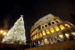 A picture from last week showing a Christmas tree in front of the ancient Colosseum in Rome