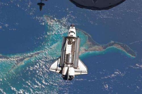 The Space Shuttle Atlantis as it approaches the International Space Station