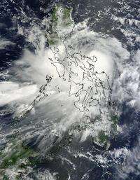 NASA sees Tropical Storm Nock-ten knocking the Philippines