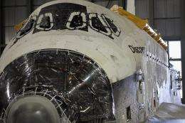 Space Shuttle Discovery is readied for transport to Washington, DC's National Air and Space museum
