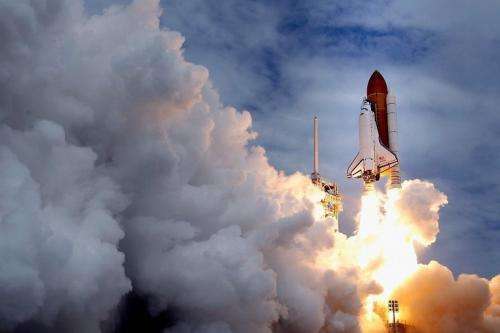 Space shuttle Atlantis blasts off from launch pad 39A at Kennedy Space Center, on July 8