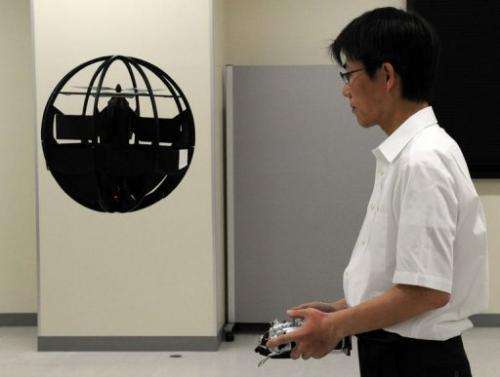 About the size of a beachball and jet black, the remote-controlled Spherical Air Vehicle resembles a tiny 'Death Star'