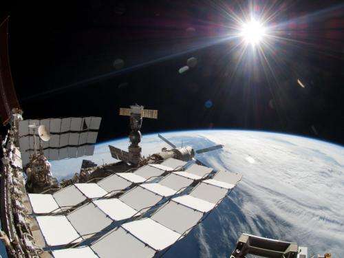 A Bright Sun and Earth's Horizon Seen From the Space Station