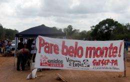 Activists block the road leading to the constrution site of Belo Monte hydroelectric dam