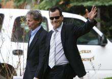 Actor Charlie Sheen (R) leaves court after attending a hearing at the Pitkin County Court house in Aspen, Colorado