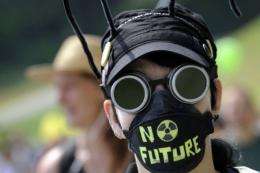 A demonstrator attends a protest in Dottingen, northern Switzerland against nuclear power