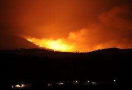 A forest fire burns in Spain in 2010