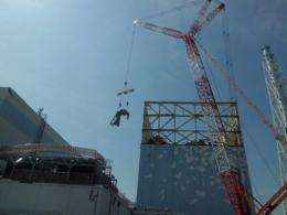 An image from Tokyo Electric Power Co of clean-up work at the Fukushina unit one reactor building