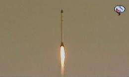 An image grab taken from Iran's Arabic-language TV channel Al-Alam shows the launch of Iran's Rassad-1 satellite