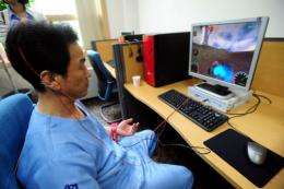 A nurse at the Save Brain Clinic demonstrates the process of neuro-feedback at Gongju National Hospital in South Korea