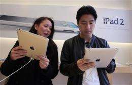 Apple earnings strong, couldn't meet iPad demand (AP)