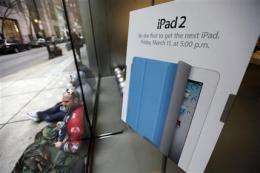 Apple fans line up to buy first batch of iPad 2s (AP)