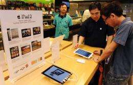 Apple's four stores in Beijing and Shanghai have begun selling the Wi-Fi model of the lighter, thinner iPad 2