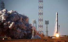 A Zenit 3F rocket carrying the Spektr-R radio astronomy observatory blasts off from Baikonur cosmodrome