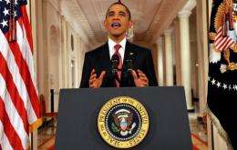 Barack Obama speaks in a rare prime-time address to the nation
