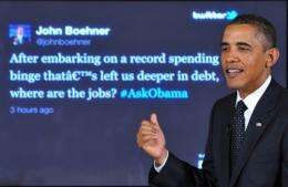 Barack Obama takes part in a "Twitter Town Hall" at the White House on Wednesday