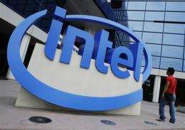 Business buying lifts Intel as tablet threat looms (AP)