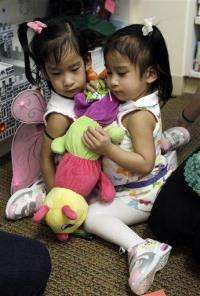 Calif. surgery to separate conjoined twins begins (AP)