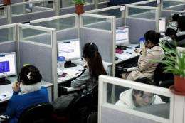 Call after call comes in to Asia's largest travel call centre, Shanghai-based Ctrip.com