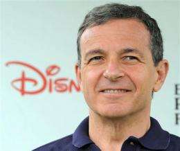 Disney CEO Iger renewed through March 2015 (AP)