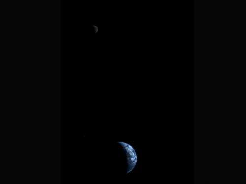 Earth and Its Moon As Seen By Voyager 1