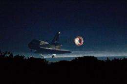 End of an era: Last space shuttle comes home (AP)