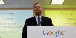 Eric Schmidt defends Google, mourns Jobs' death (AP)