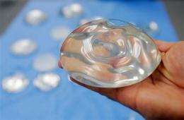 FDA concludes silicone breast implants mostly safe (AP)