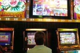 Poker machine revenues hurt by smoking bans, financial crisis