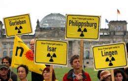 Germany's parliament has approved plans to phase out nuclear energy by 2022