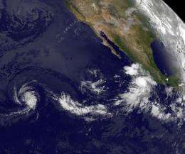 GOES-11 satellite sees Tropical Storms Fernanda and 'little brother' Greg chasing each other