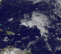GOES-13 sees an extraordinarily early Atlantic low in the tropics