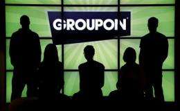 Groupon raises $700M with IPO at $20 per share (AP)