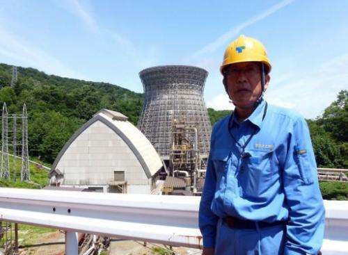 Kazuhiro Takase shows AFP around Japan's first geothermal plant