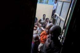 Kenya HIV families torn between health or food (AP)
