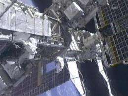 Last shuttle spacewalkers make history above Earth (AP)
