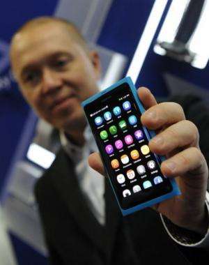 Marko Ahtisaari displays a Nokia N9 smartphone