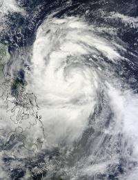NASA sees Typhoon Nesat nearing landfall in northern Philippines