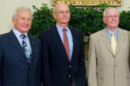 Neil Armstrong (R), and fellow Apollo 11 crewmembers Edwin "Buzz" Aldrin (L) and Michael Collins (C)
