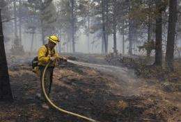 NM fire poised to become largest in state history (AP)