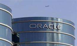 Oracle's net rises 36 percent, but servers slip (AP)