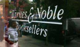 People walk by a Barnes & Noble store in New York