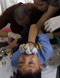 Philippine city holds mass circumcision for youths (AP)