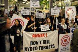 Protesters demonstrate against the possible end of the Kyoto Protocol in 2009